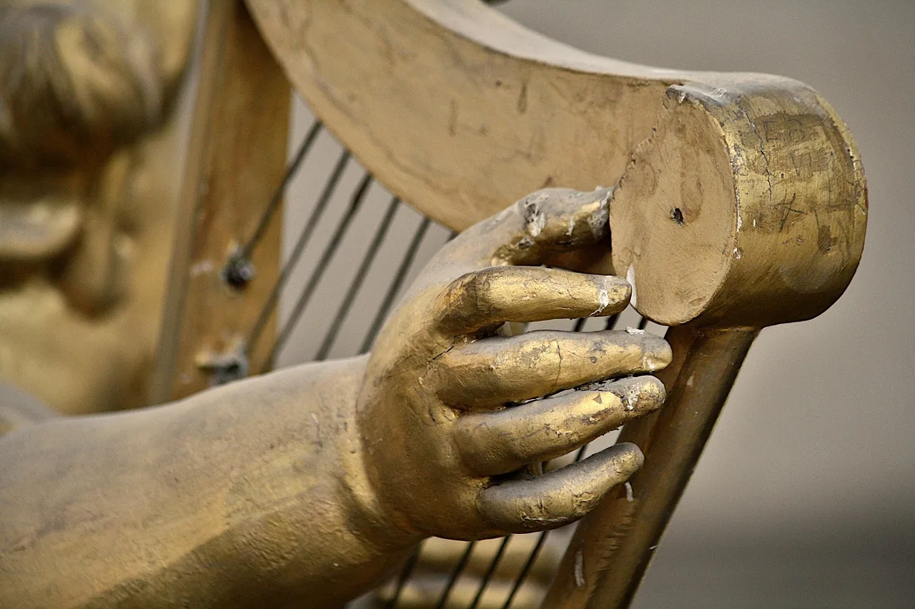 ancient harp carved with gilding ancient harp carved with gilding