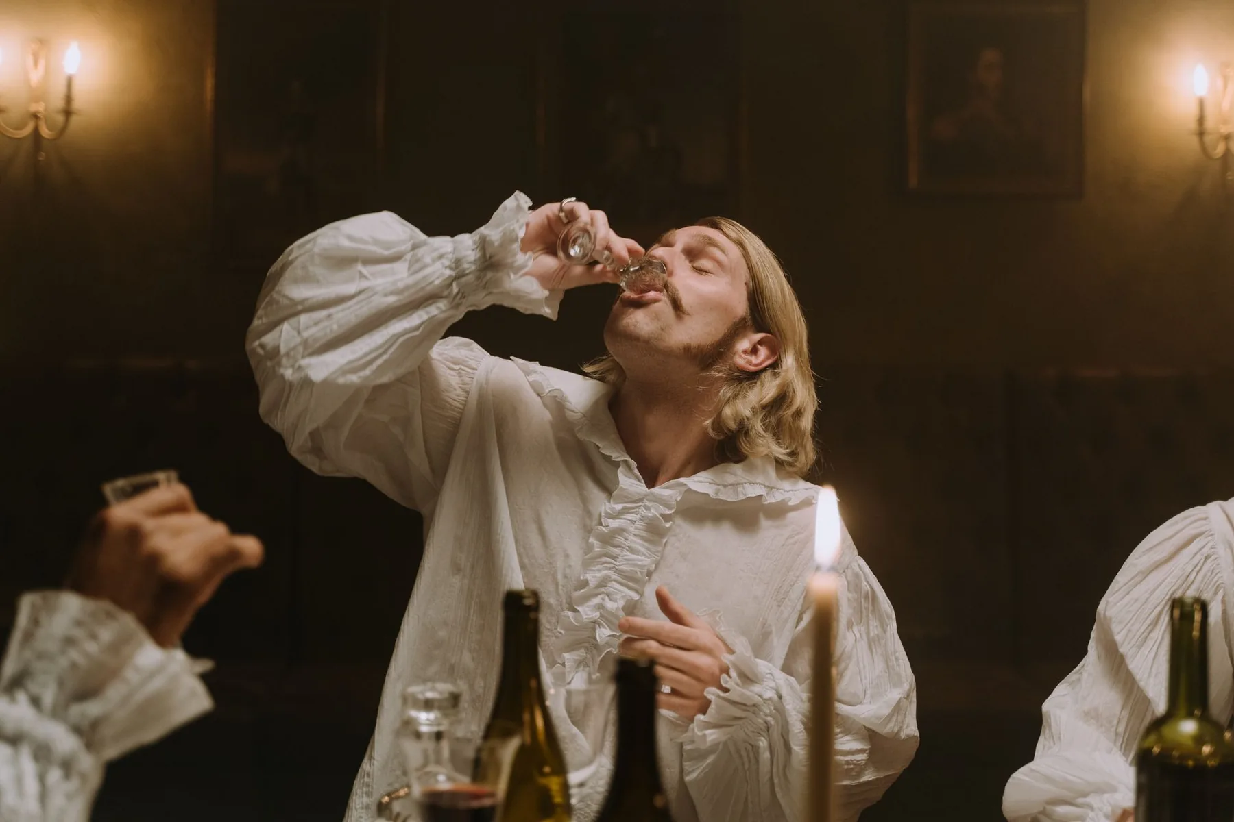 Candlelit banquet in a medieval tavern Candlelit banquet in a medieval tavern