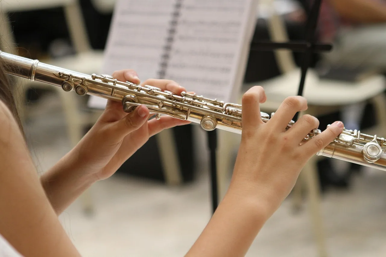 Transverse flute and sheet music Transverse flute and sheet music