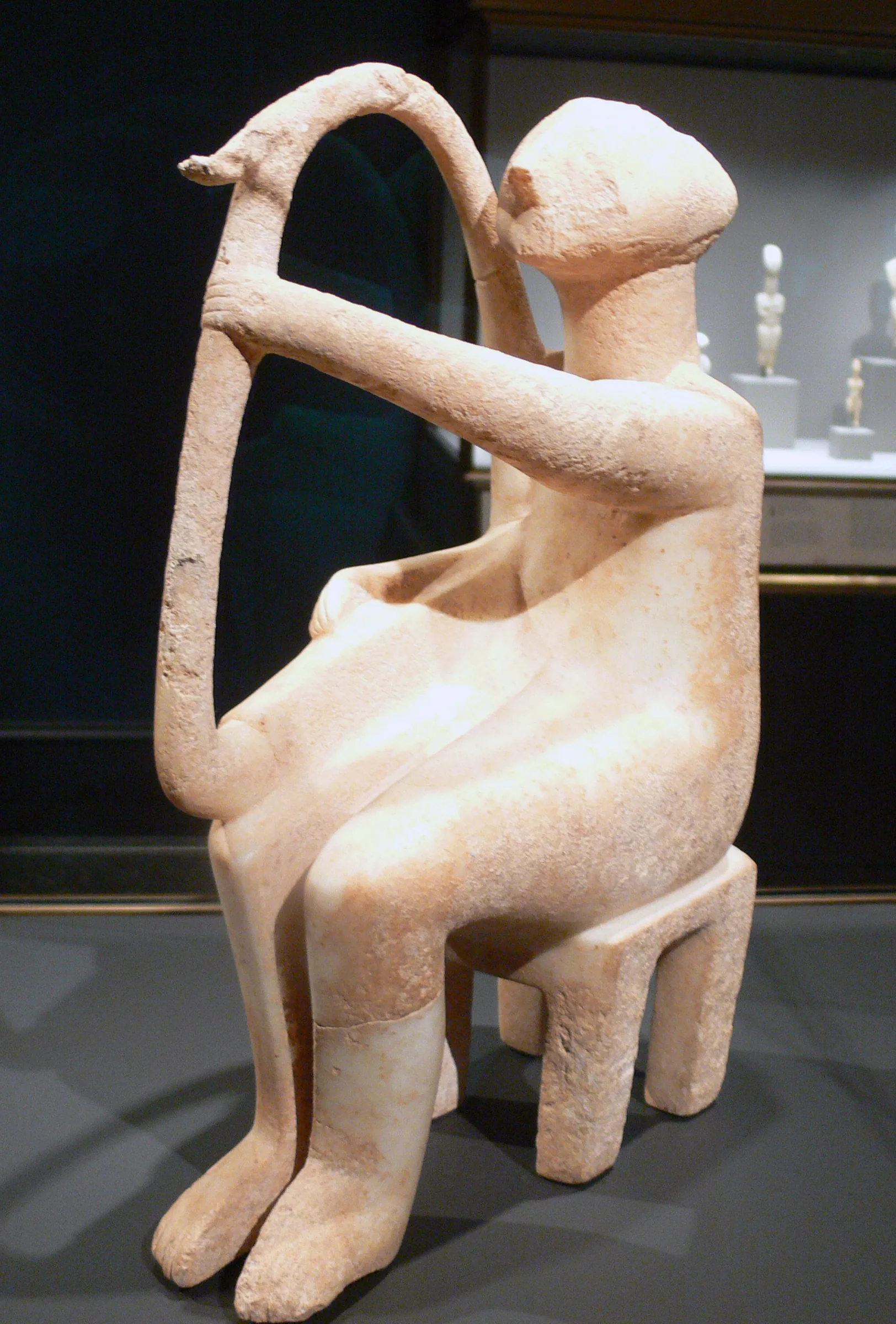 Ancient statue of a harp player Ancient statue of a harp player