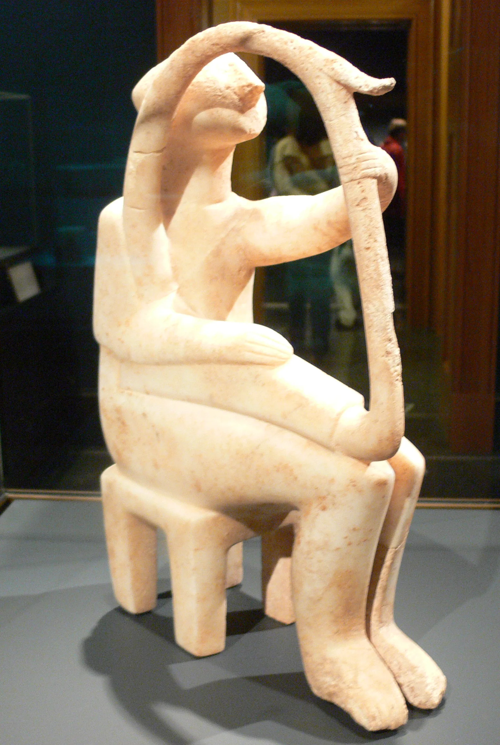 ancient statue of a harp player ancient statue of a harp player