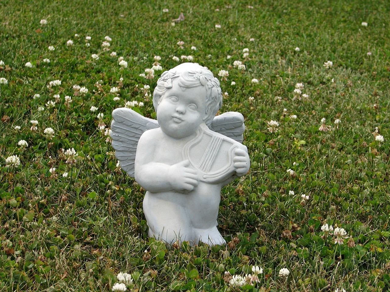 musical cherub with small lyre musical cherub with small lyre