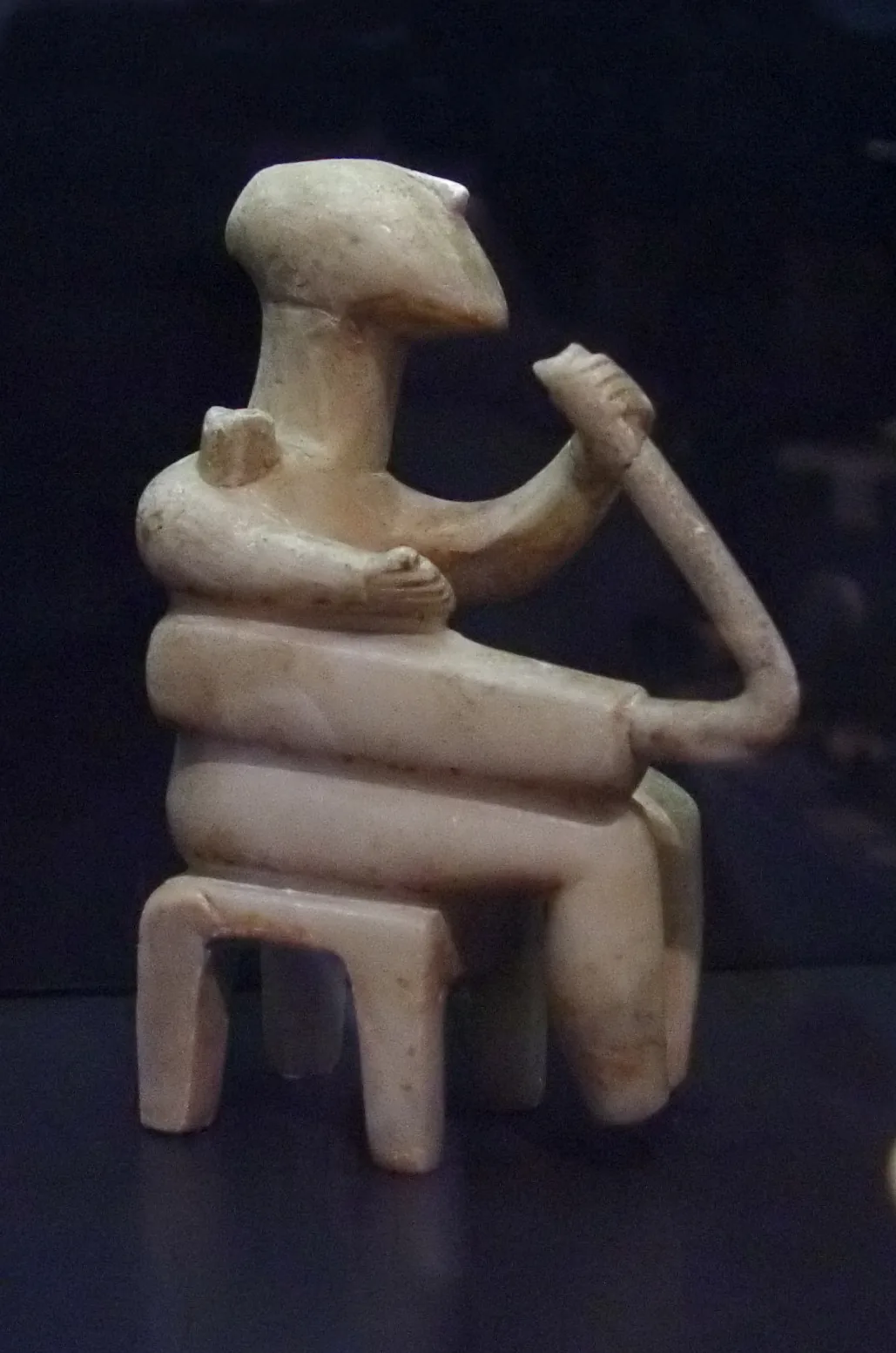 Ancient figurine playing the harp Ancient figurine playing the harp