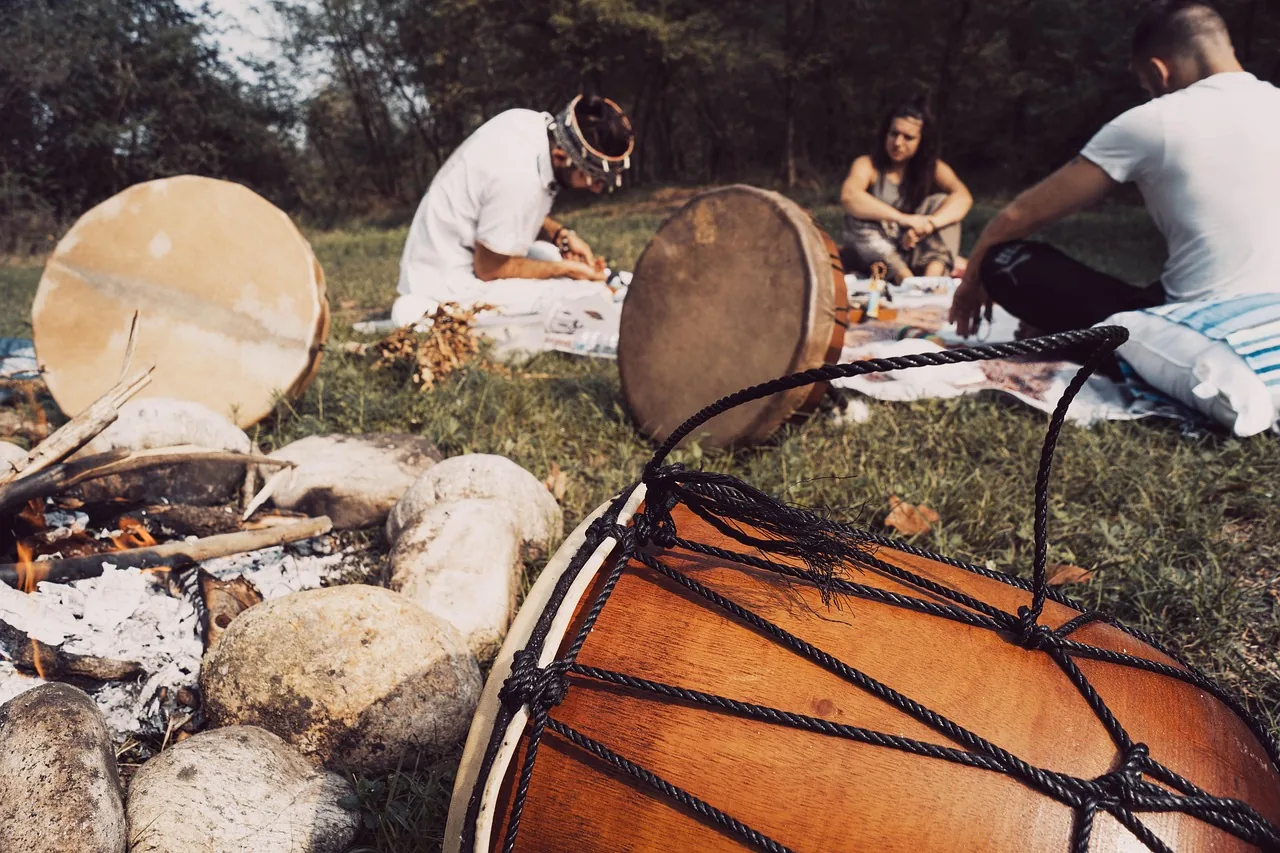 djembes and musicians around the fire djembes and musicians around the fire