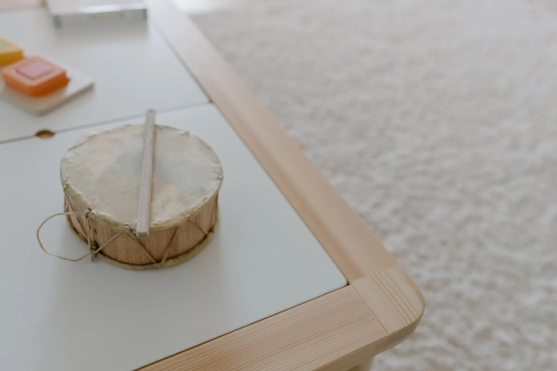small handmade drum on table
