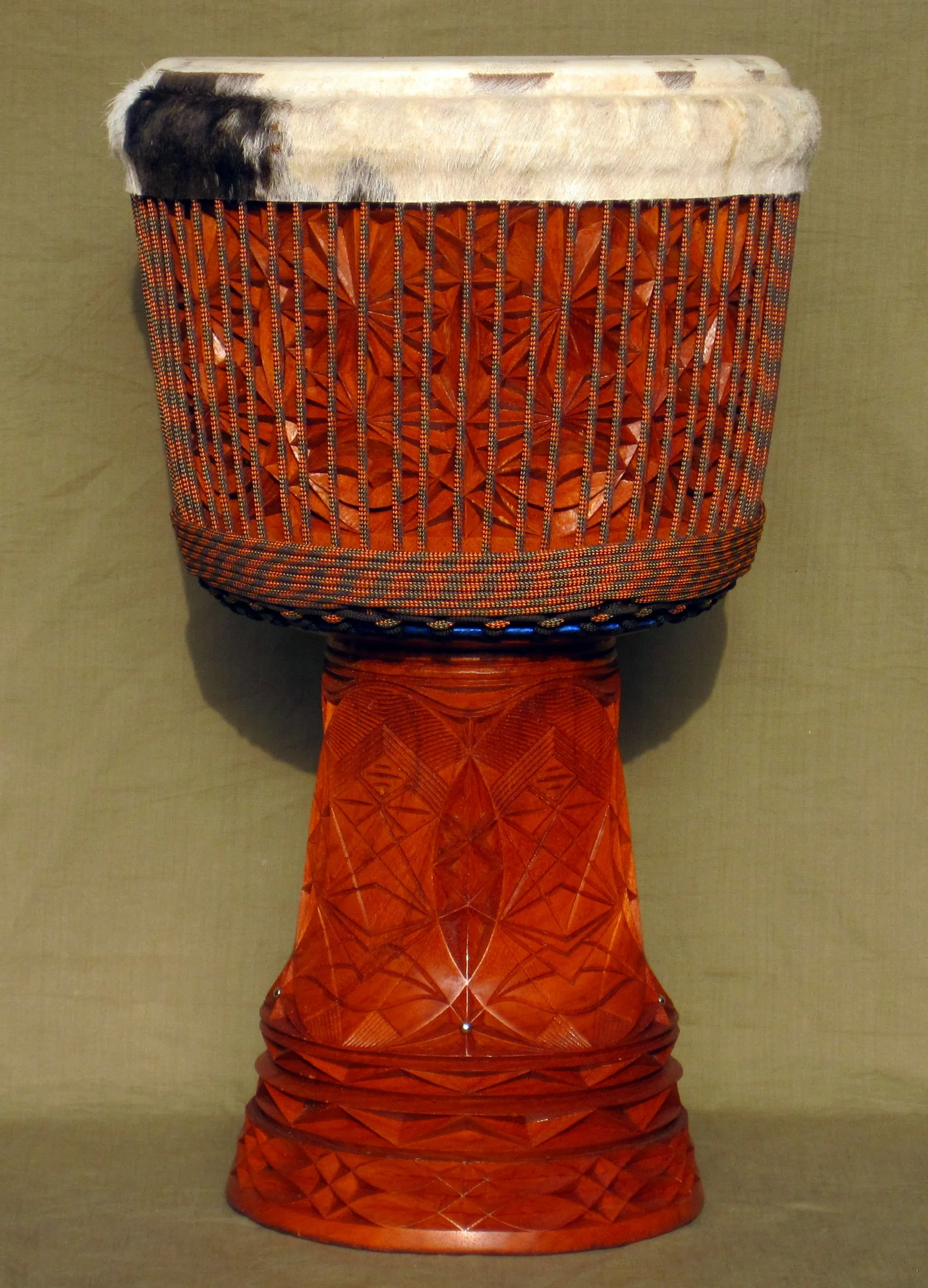 carved African wooden djembe carved African wooden djembe