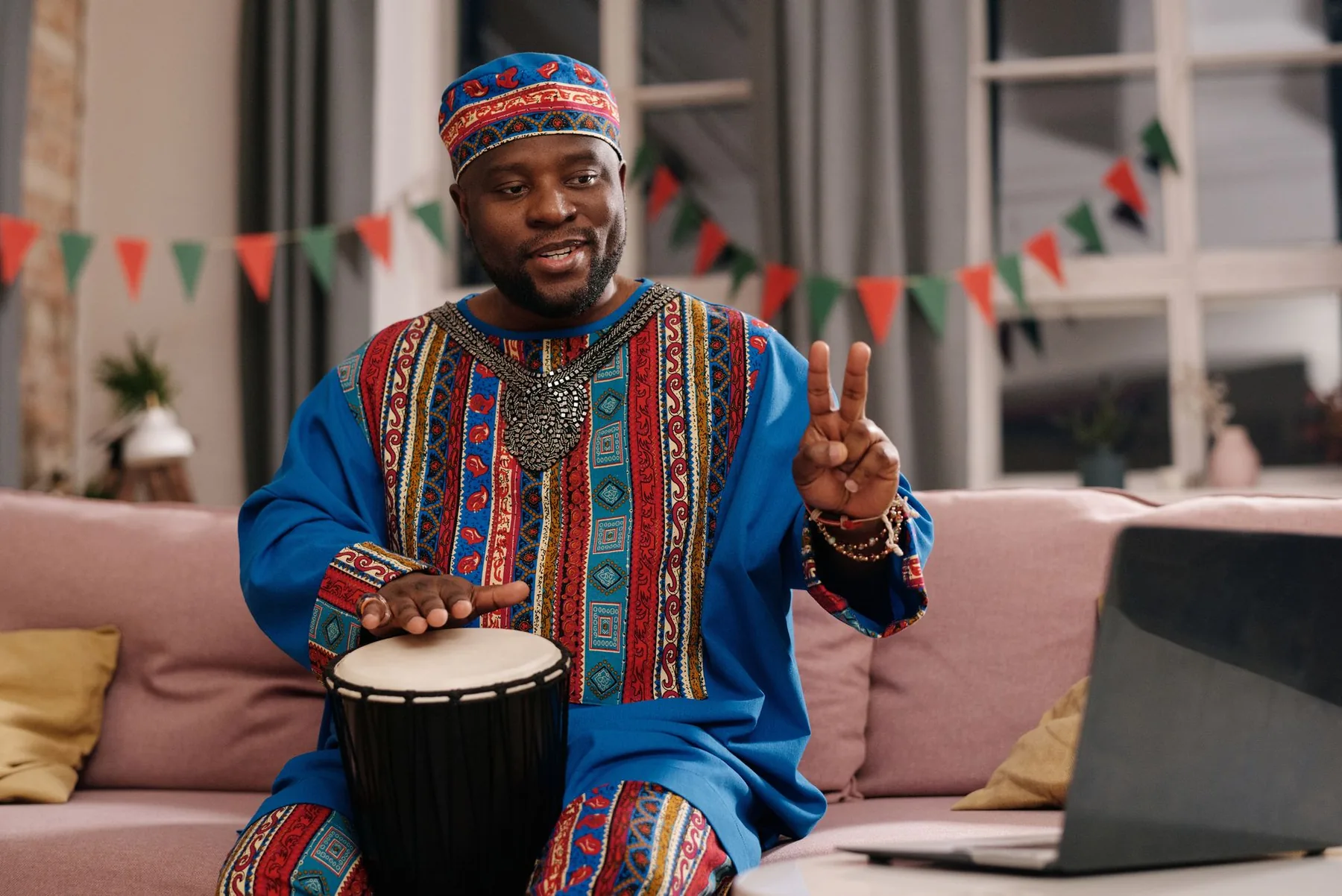 African musician playing djembe African musician playing djembe